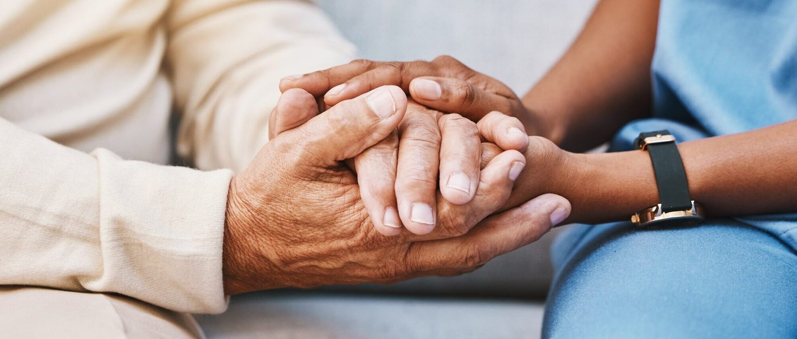 Nurse, hands and senior patient in empathy, safety and support of help, trust and healthcare consulting. Nursing home, counseling and gratitude for medical caregiver, client and hope in consultation